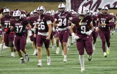 Day flips momentum, Reyes throws four touchdowns as Lee pulls away from Franklin, 48–17